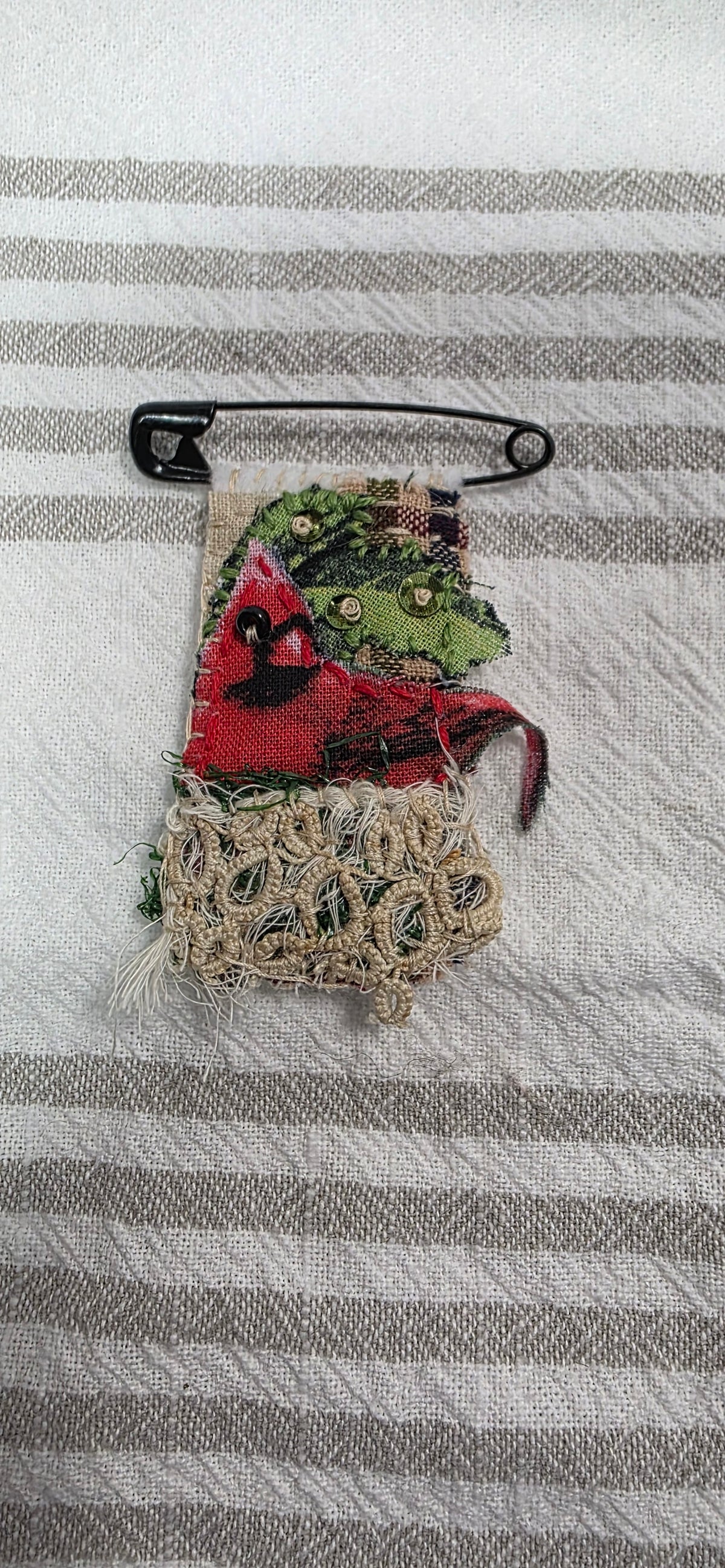 Slow stitched broach